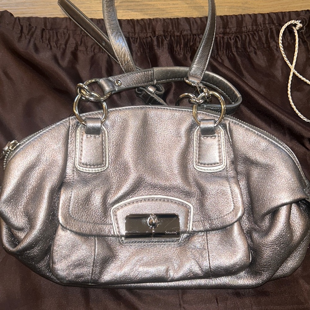 Authentic Coach Style No. B1220-19304 gray/silver bag, purple lining.
